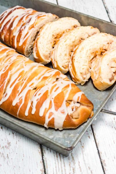 Looking for the most delicious moist cinnamon apple bread recipe? Look no further! This tasty apple cinnamon bread topped with maple will be this season's favorite!