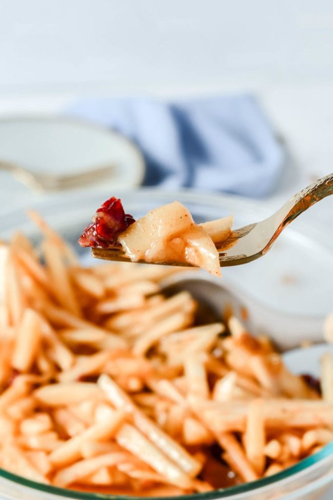 Apple Pear Slaw with Caramel Cider Vinaigrette is a crunchy, sweet, and tangy salad that makes a perfect side to hearty main dishes.