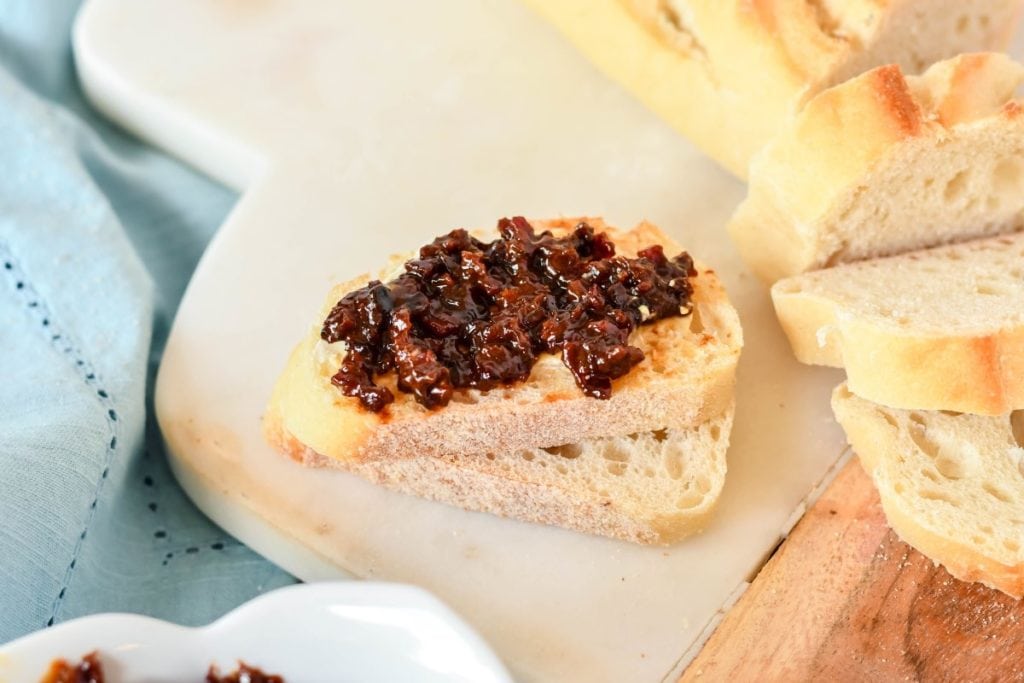 This bacon jam recipe is about to change your life for the best (literally the best you'll ever have). Spread it on toast, use it as a burger topping or savor the flavor crackers. You'll never go back to plain old jam again!