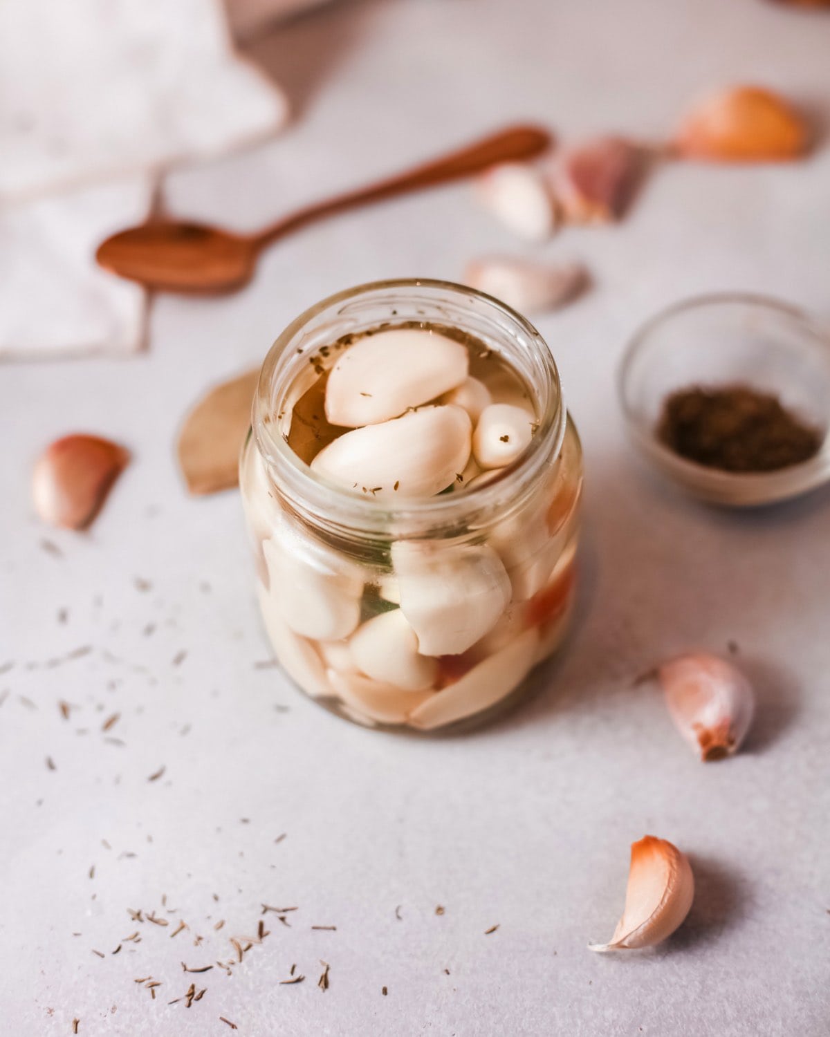 This french pickled garlic recipe is incredibly easy to make and so delicious! The perfect Mediterranean appetizer or salad topping, this mellow garlic is a mouthwatering treat.