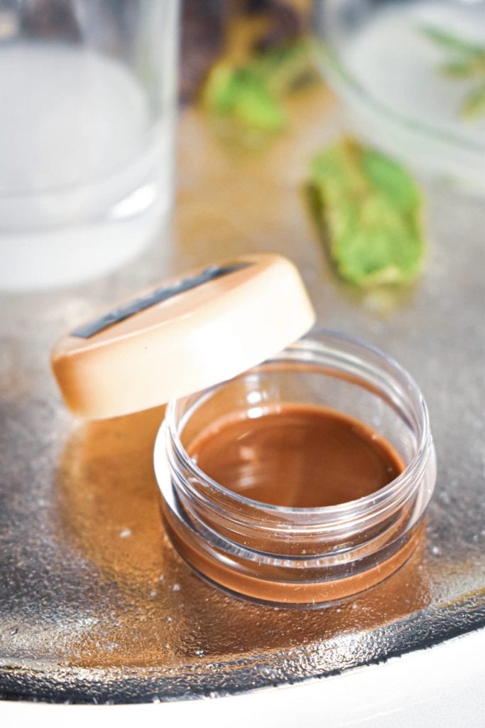 Easy homemade lip gloss recipe with tasty chocolate and peppermint extract! Give your lips the hydration it needs with this DIY sugar lip scrub.