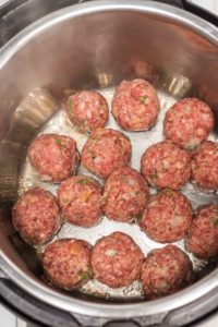 This instant pot spaghetti and meatballs is an easy one-pot recipe with mouth-watering homemade meatballs.