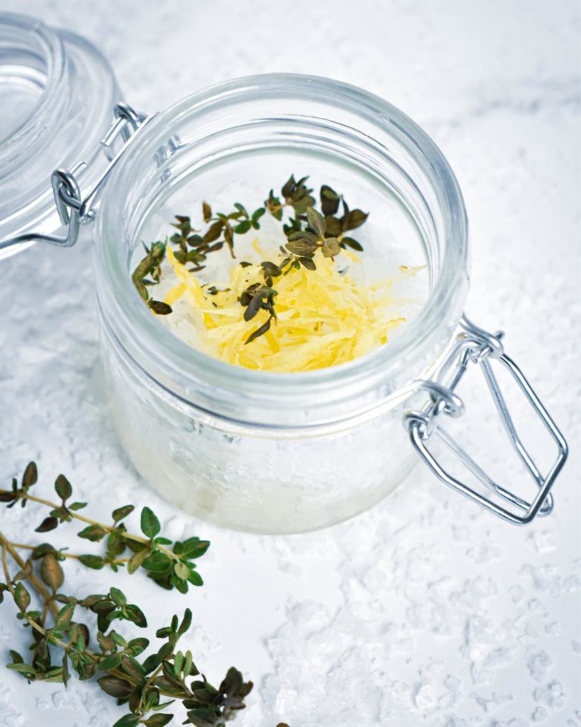 Make this homemade DIY lemon thyme salt scrub with just 4 ingredients for glowing skin. Gently exfoliate, nourish and moisturize skin.