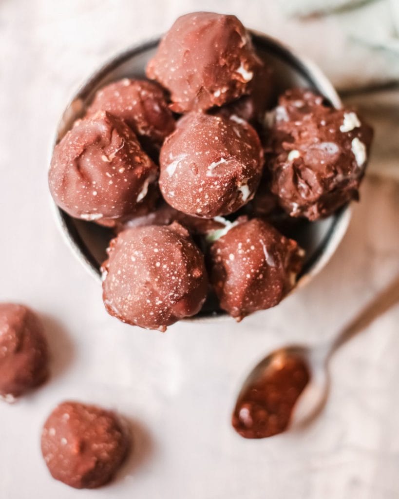 These tasty Mint Chip Ice Cream Bon Bons will not be forgotten any time soon. They are creamy, tasty, and perfect guilty pleasure this summer! Make with your favorite ice cream (or try your hands on making the best vanilla ice cream) and deep in chocolate - so easy to make this dessert.