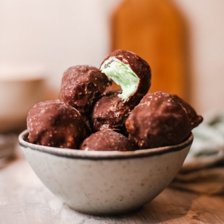 These Mint Chip Ice Cream Bon Bons are homemade ice cream bites covered with chocolate and way better than the ones in the freezer aisle.