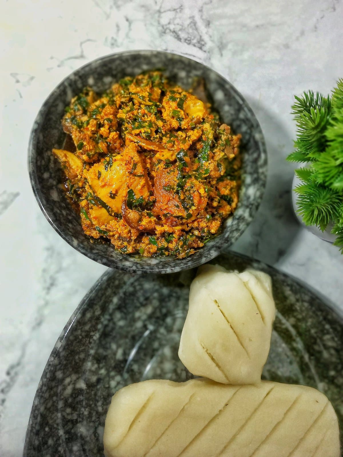 [VIDEO] Pounded Yam and Egusi Soup How To Make Egusi Soup
