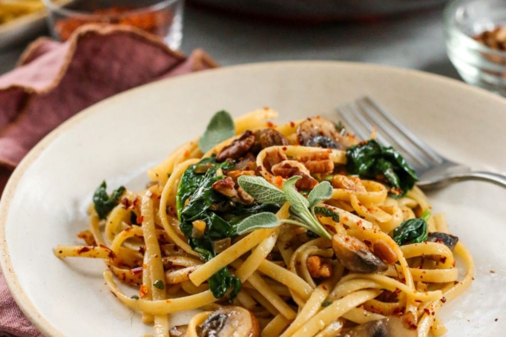 BROWN BUTTER MUSHROOM PASTA WITH SAGE AND PECANS BY STREET SMART NUTRITION
