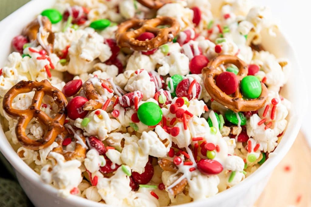 Christmas popcorn with pretzels and candy canes.