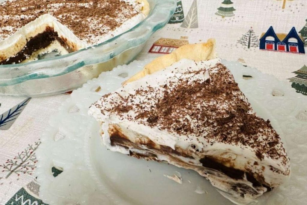 A delectable slice of chocolate ice cream pie on a plate.