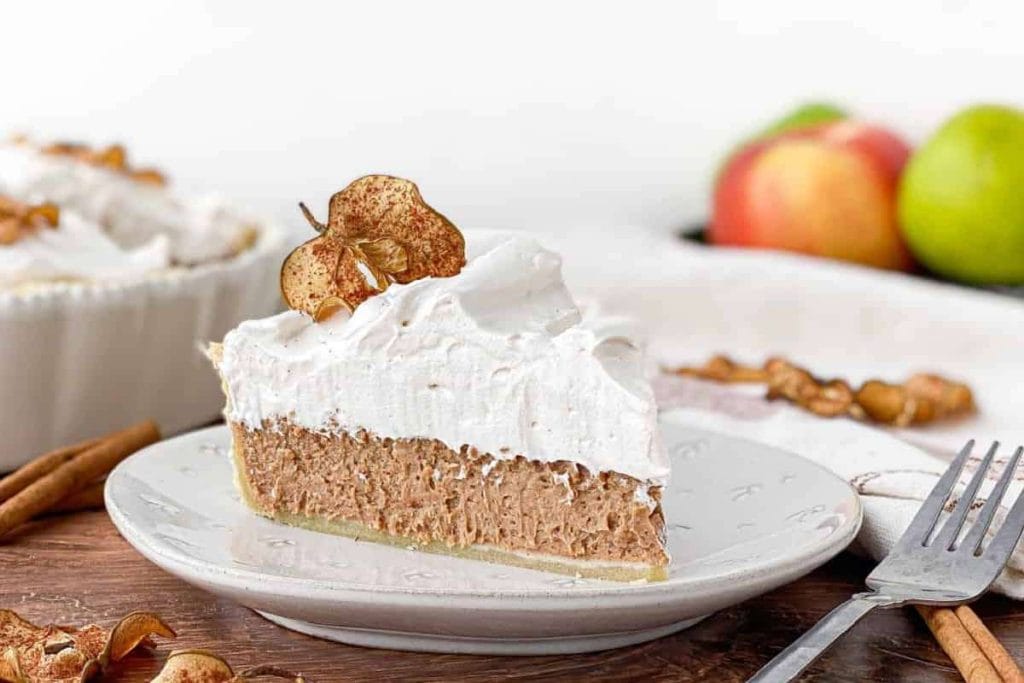 A delicious slice of apple pie on a plate.