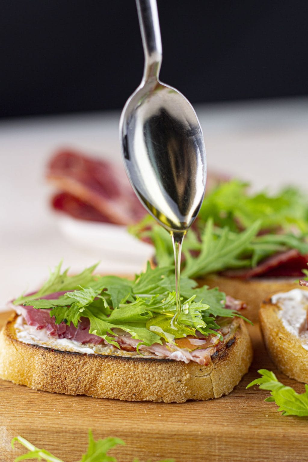 Prosciutto Arugula Bruschetta with Mascarpone and Honey