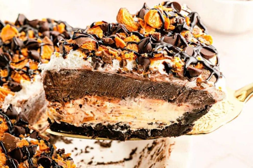 A delicious slice of chocolate peanut butter pie on a plate.