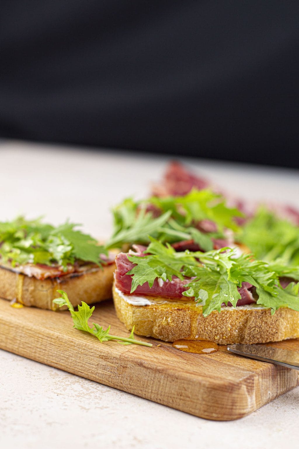 Prosciutto Arugula Bruschetta with Mascarpone and Honey
