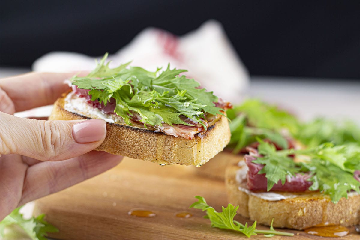 Prosciutto Arugula Bruschetta with Mascarpone and Honey