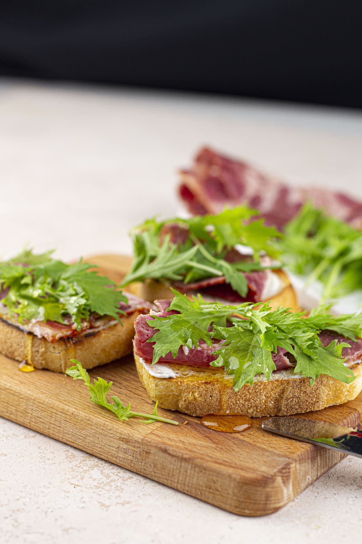 Prosciutto Arugula Bruschetta with Mascarpone and Honey