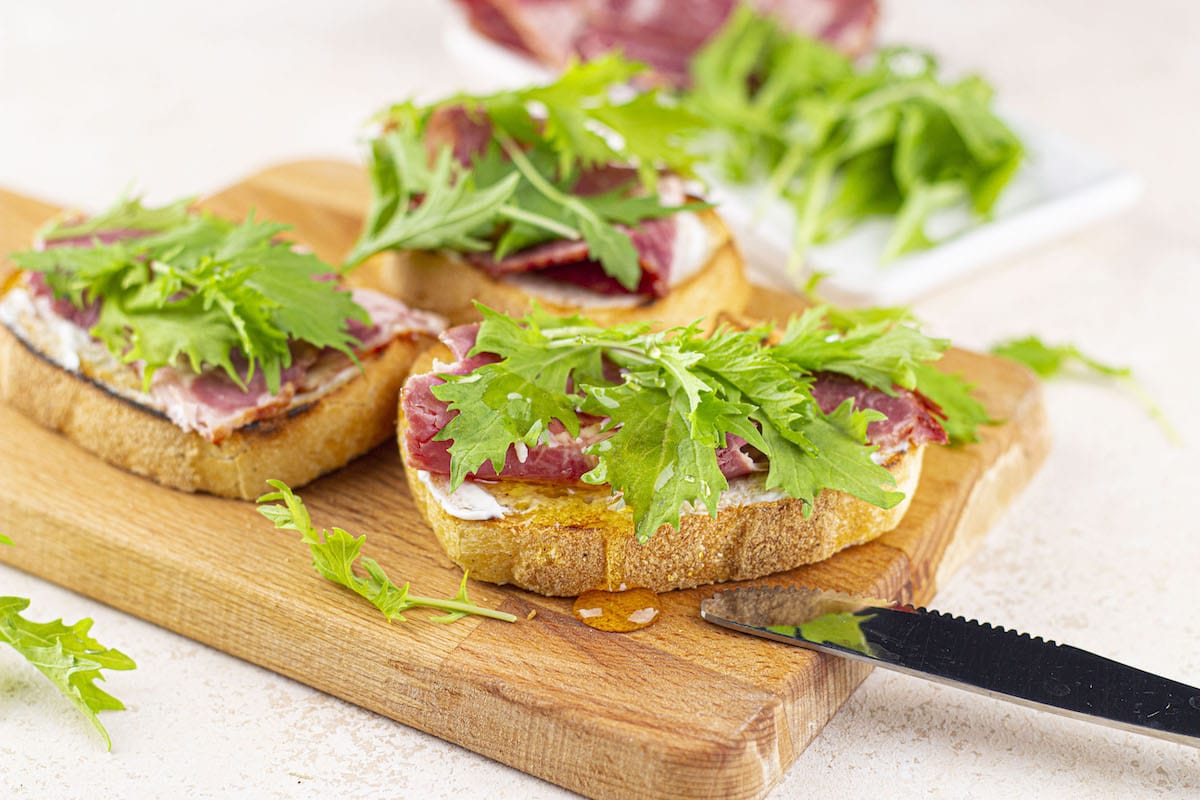 Prosciutto Arugula Bruschetta with Mascarpone and Honey