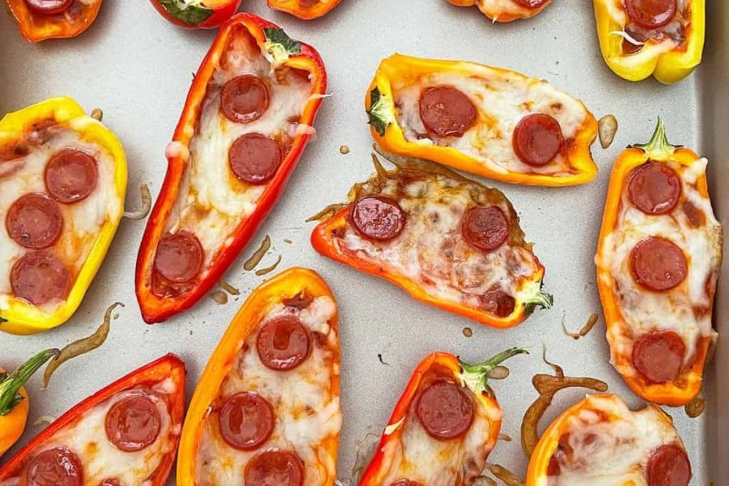 A mouthwatering cheese and pepper stuffed pepperoni pizza, perfect for game day snacking.