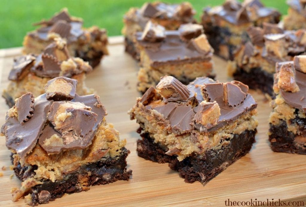 In honor of National Peanut Butter Lovers' Day, indulge in these delicious peanut butter cookie bars on a cutting board.