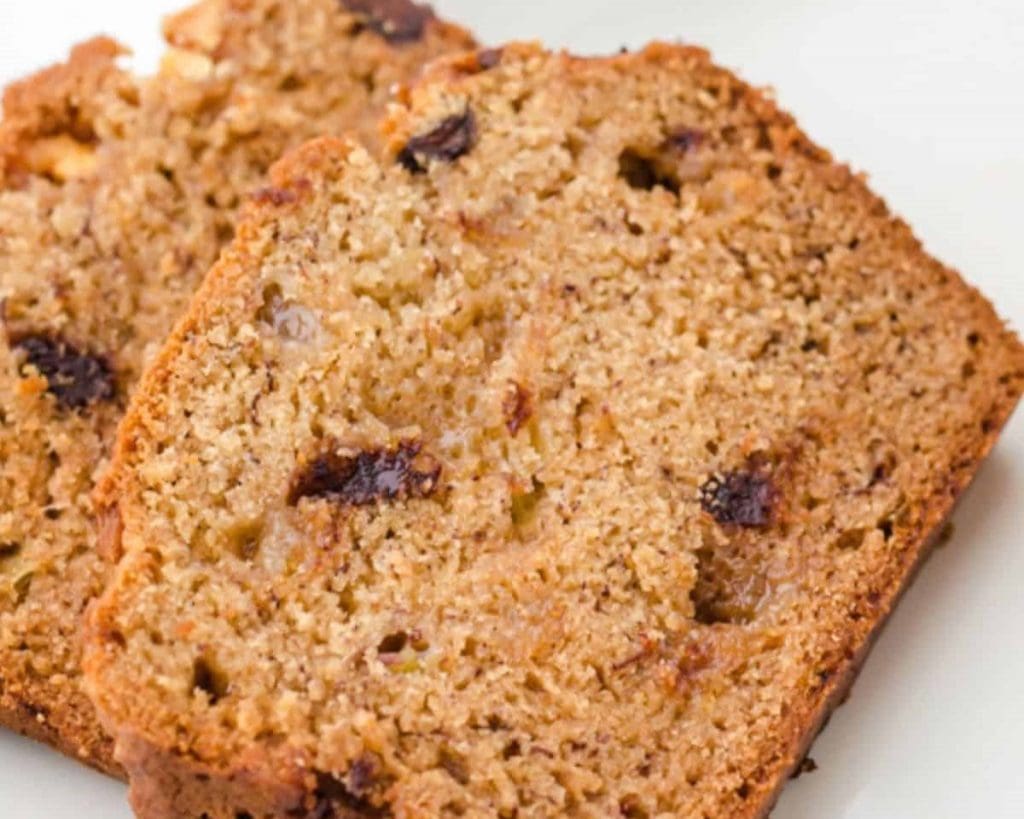 Celebrate National Peanut Butter Lovers' Day with two slices of banana bread on a plate.