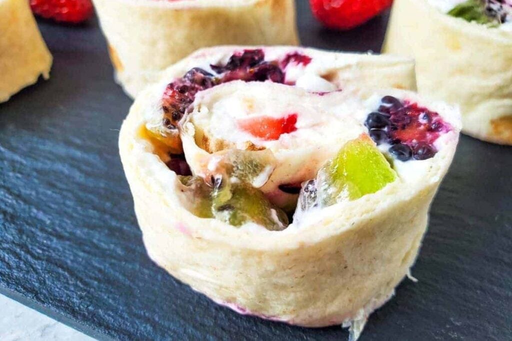 Easy Fruit Pinwheels with Cream Cheese and Berries by Thriving In Parenting