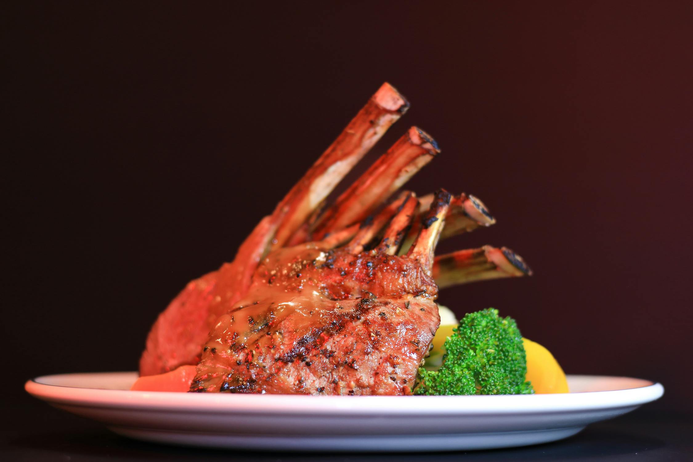 free photo of succulent grilled lamb chops with vegetables 1