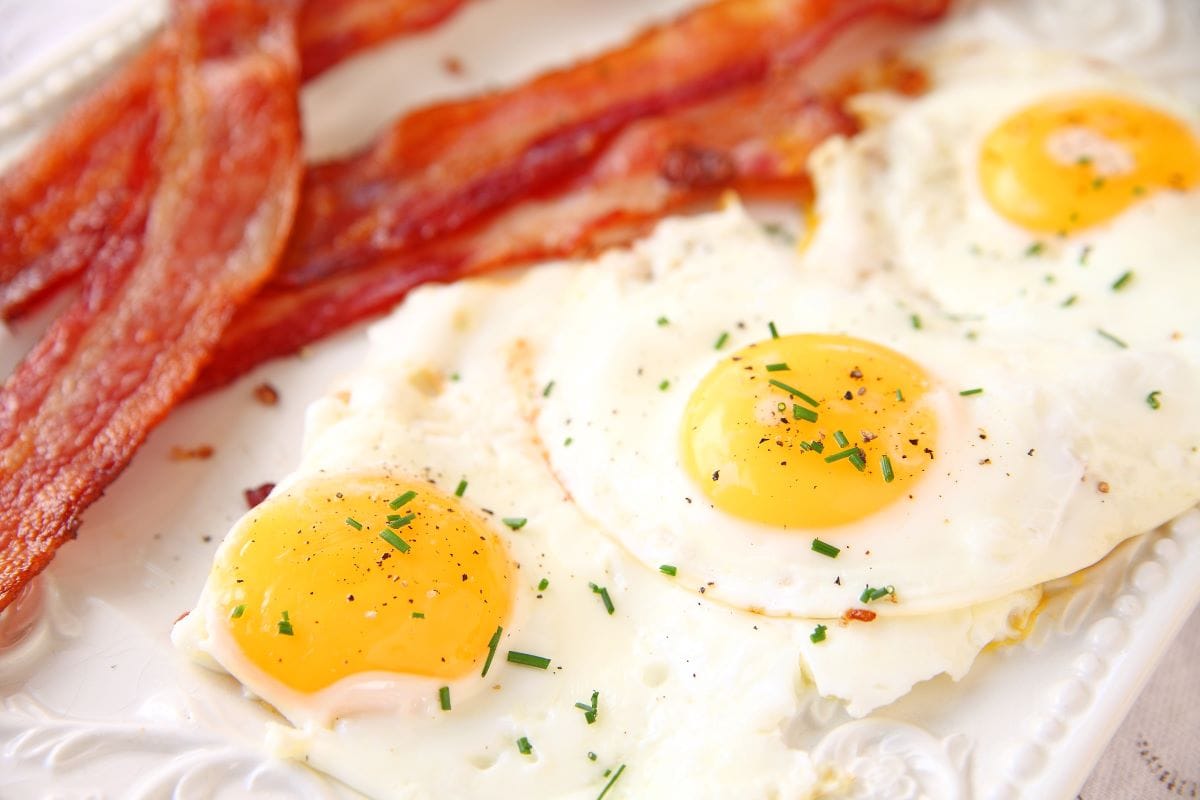 A platter of baconeggsAliced