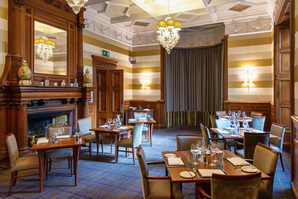 Dining with fireplaceChecco