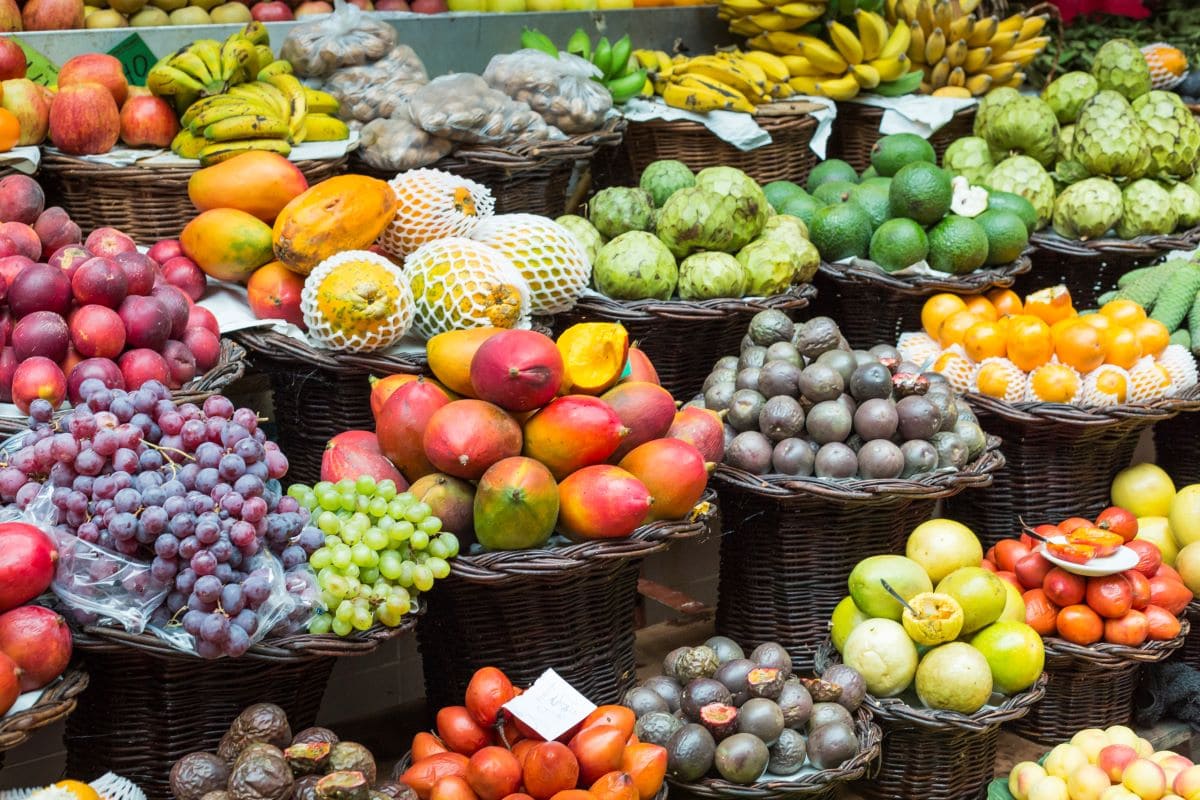 Vibrant fruit in marketCurioso Travel Photography