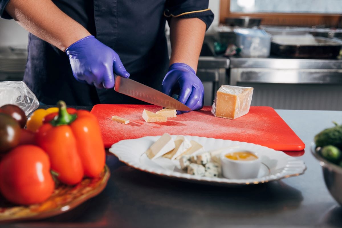 Chef cutting cheeseAntonMatyukha