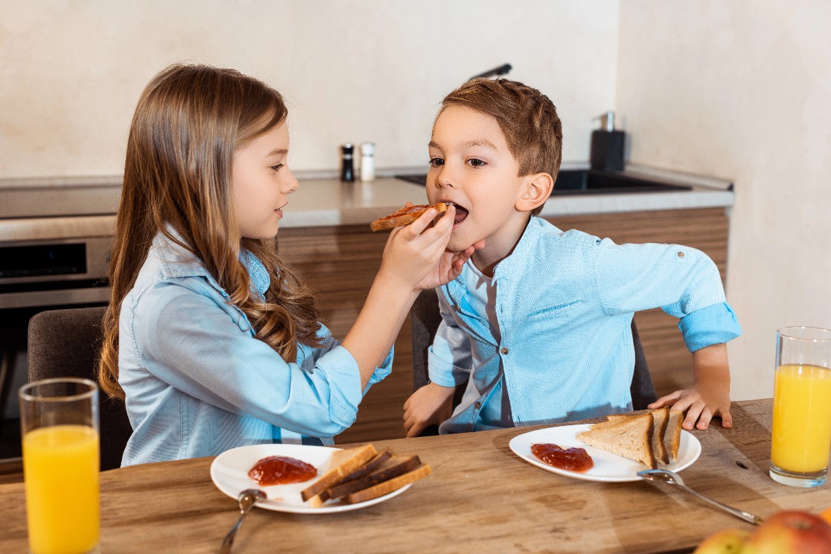 Children eating toasted bread
