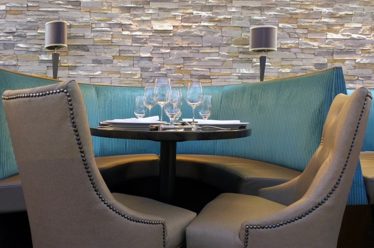 Velvet booth in restaurantLucidwaters