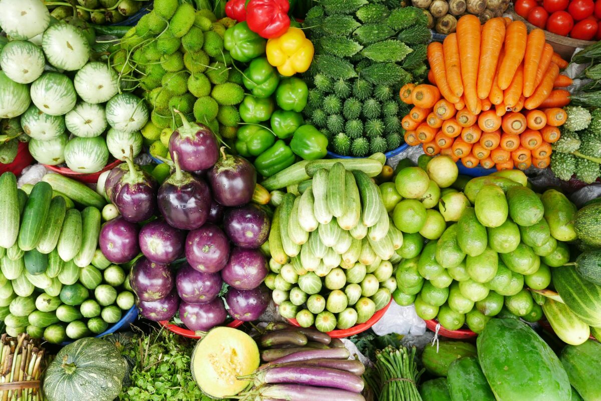 Colorful assortment of fresh vegetables at a farmers market, perfect for culinary inspiration.