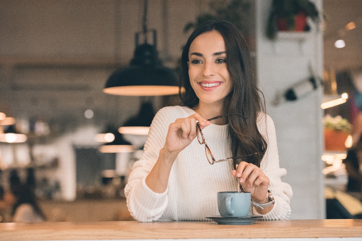woman in a cafe without digital gadget