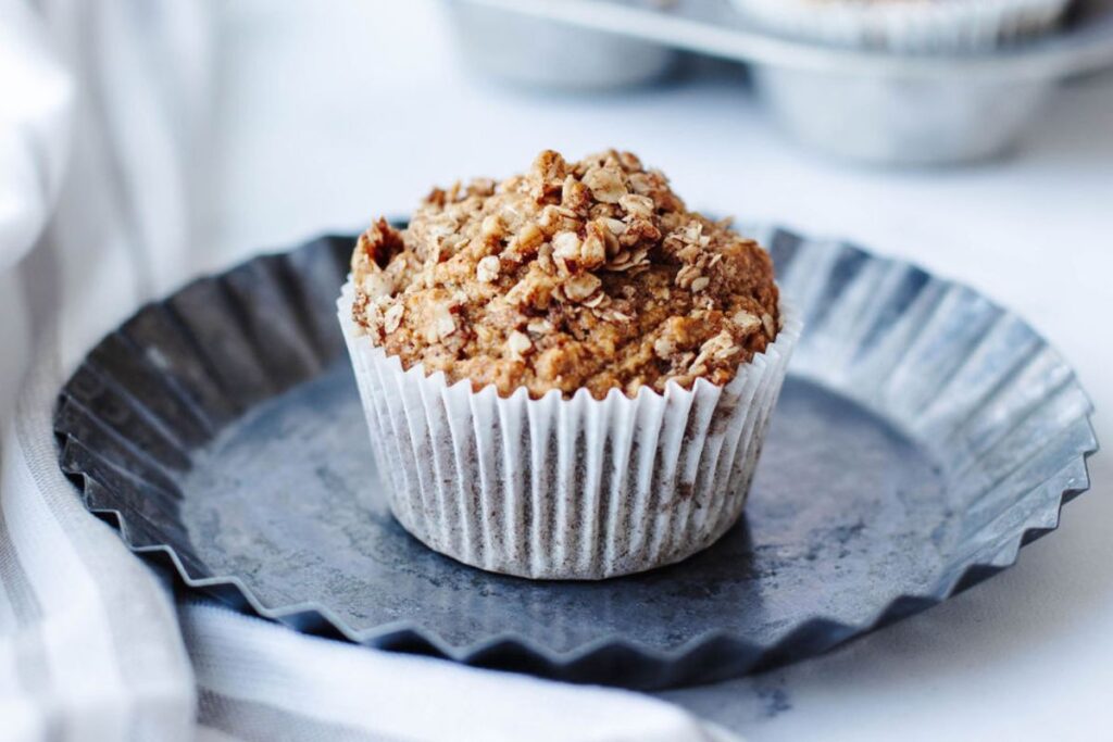 Applesauce Cinnamon Oat Muffins by The Cookin Chicks