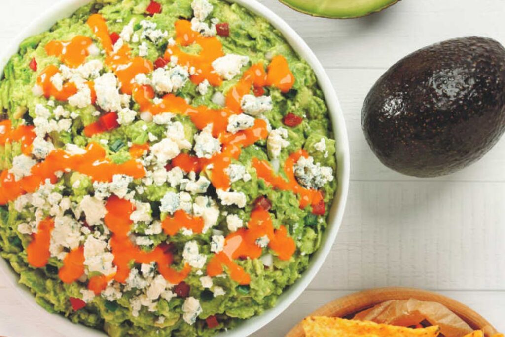 Buffalo Chicken Guacamole Dip by Mommy Evolution