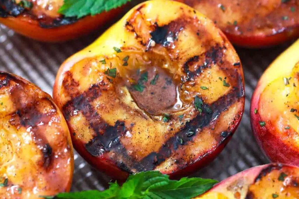 Grilled Peaches by Sweet and Savory Meals