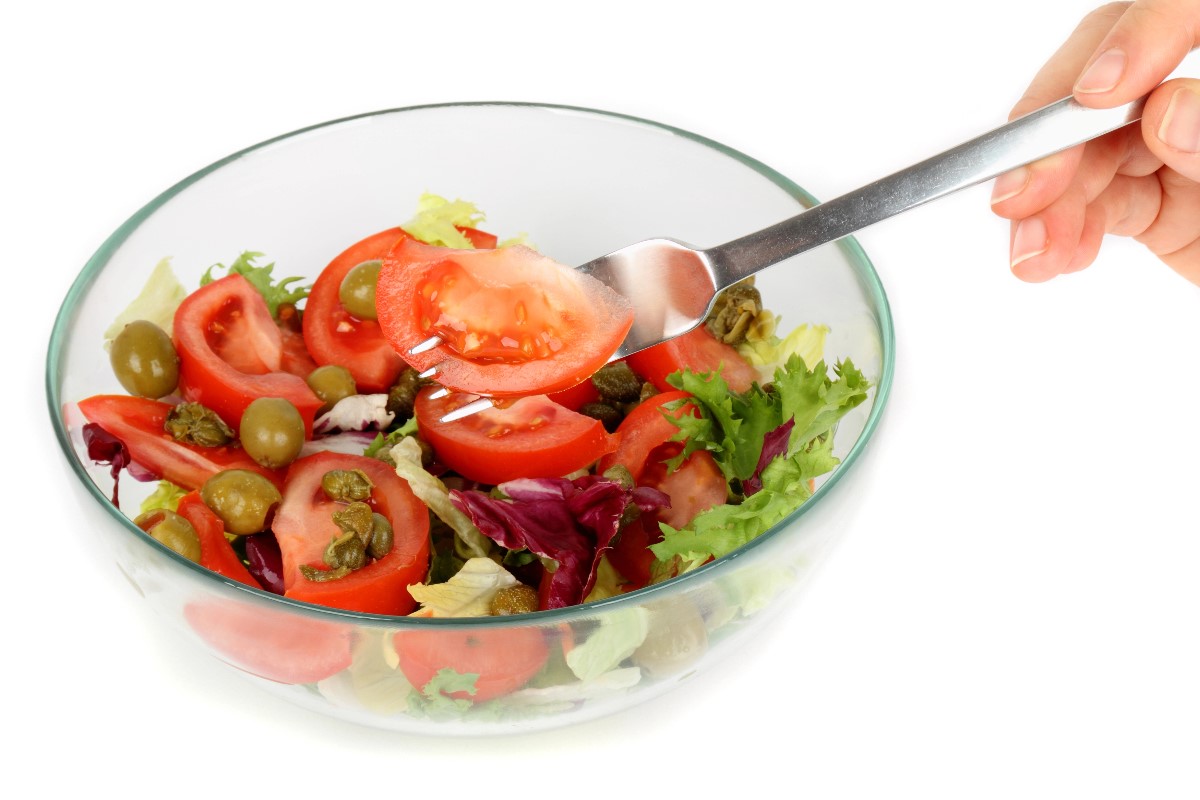 Hand on salad