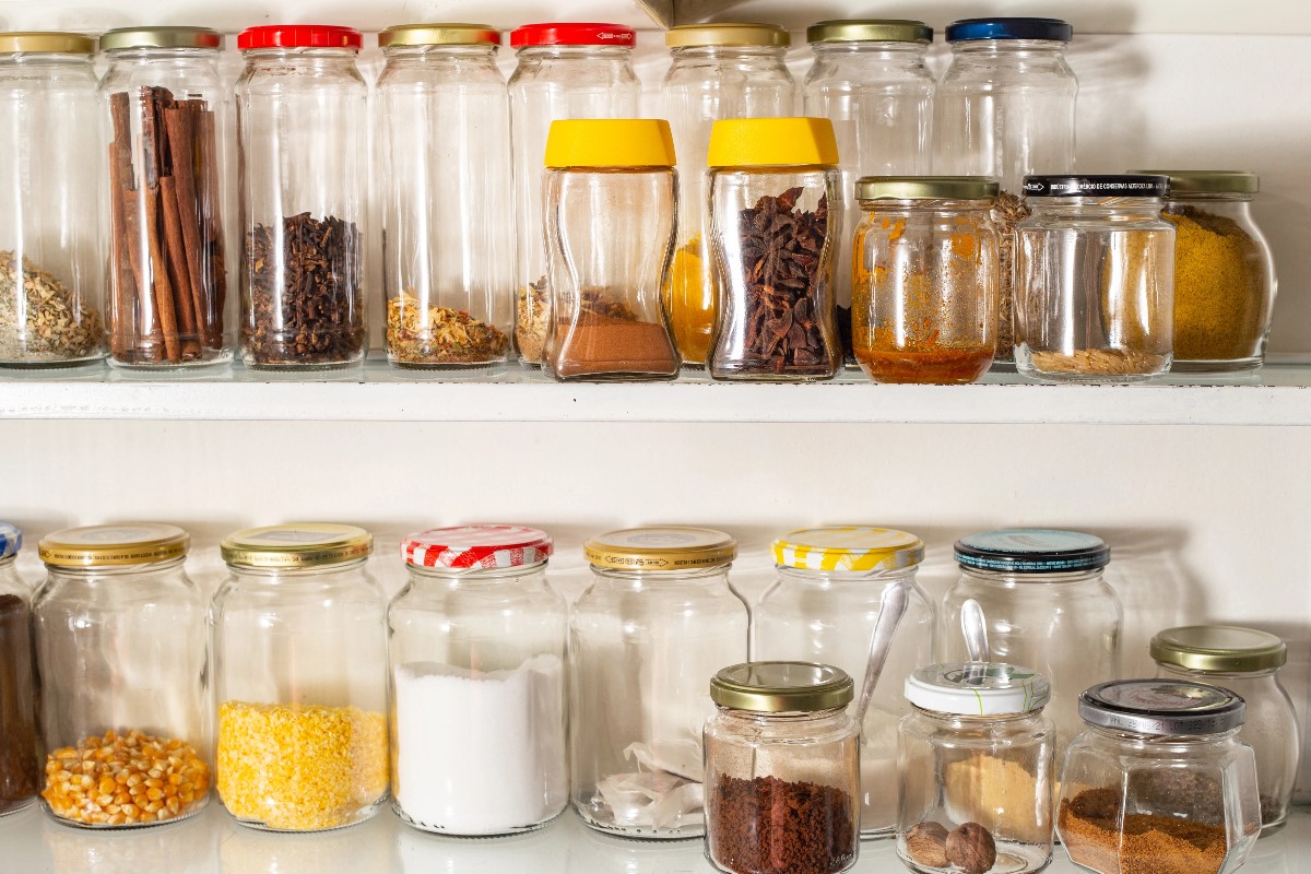 Shelf with spices and arranged jars
