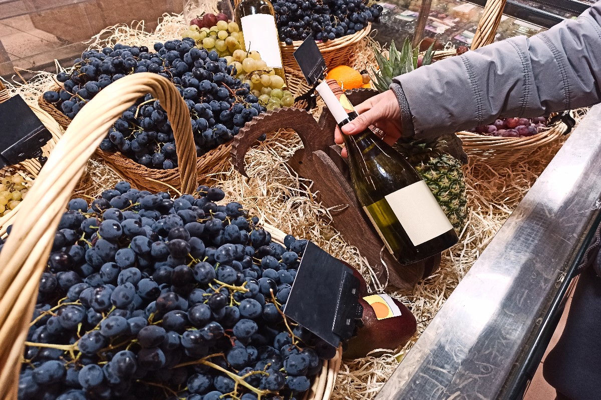 Wine with groceries in store