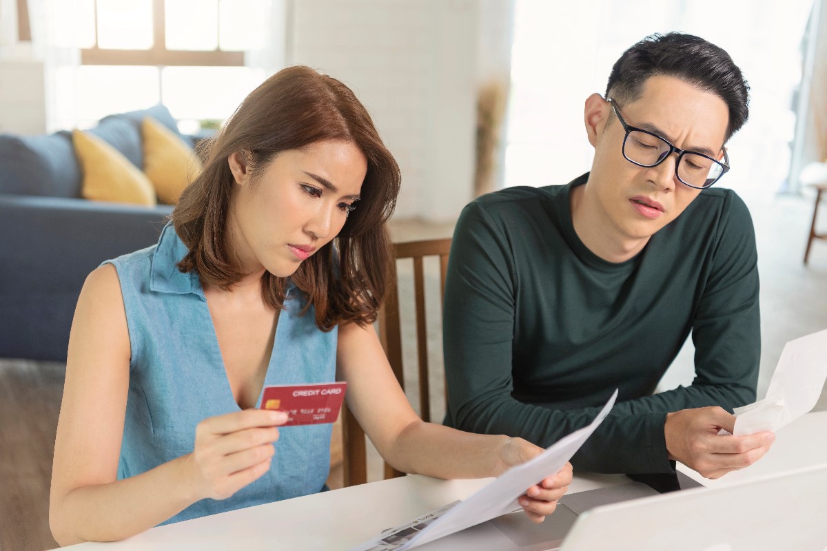 Woman checking card statement