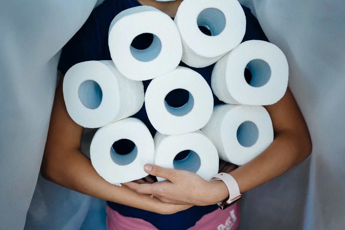 Woman stocking toilet papers