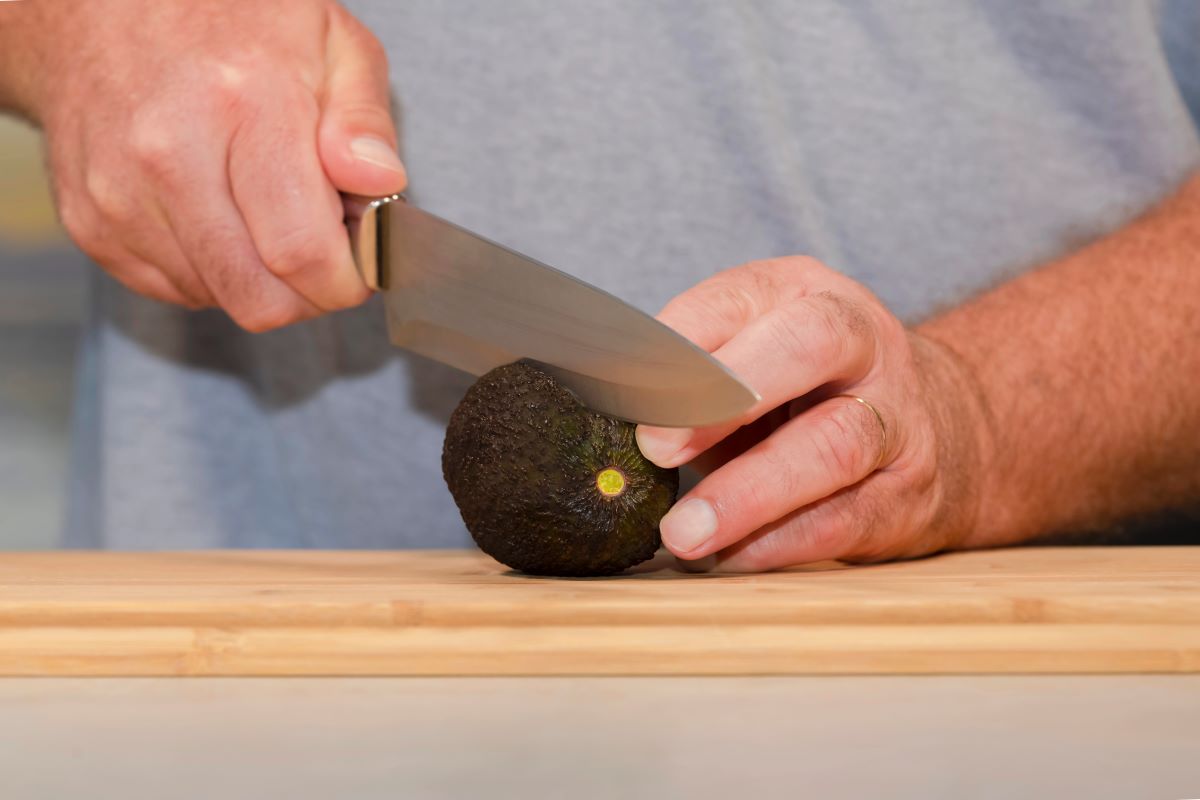 avocado with knife