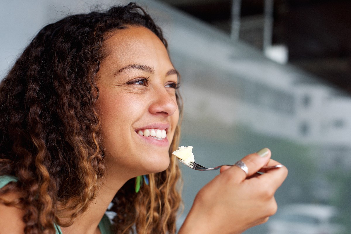 woman eating cheese