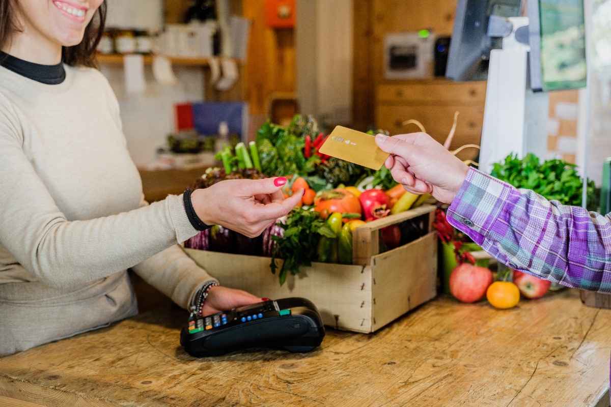 woman paying with card