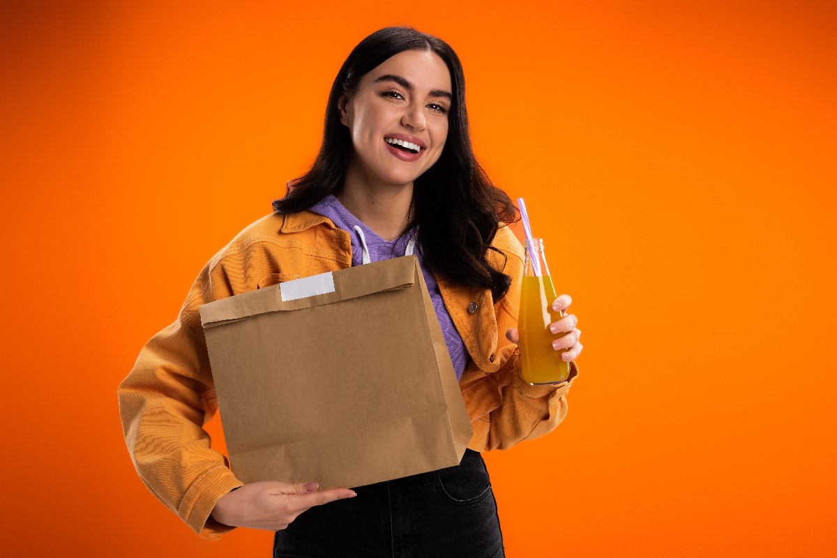 woman with take out bag
