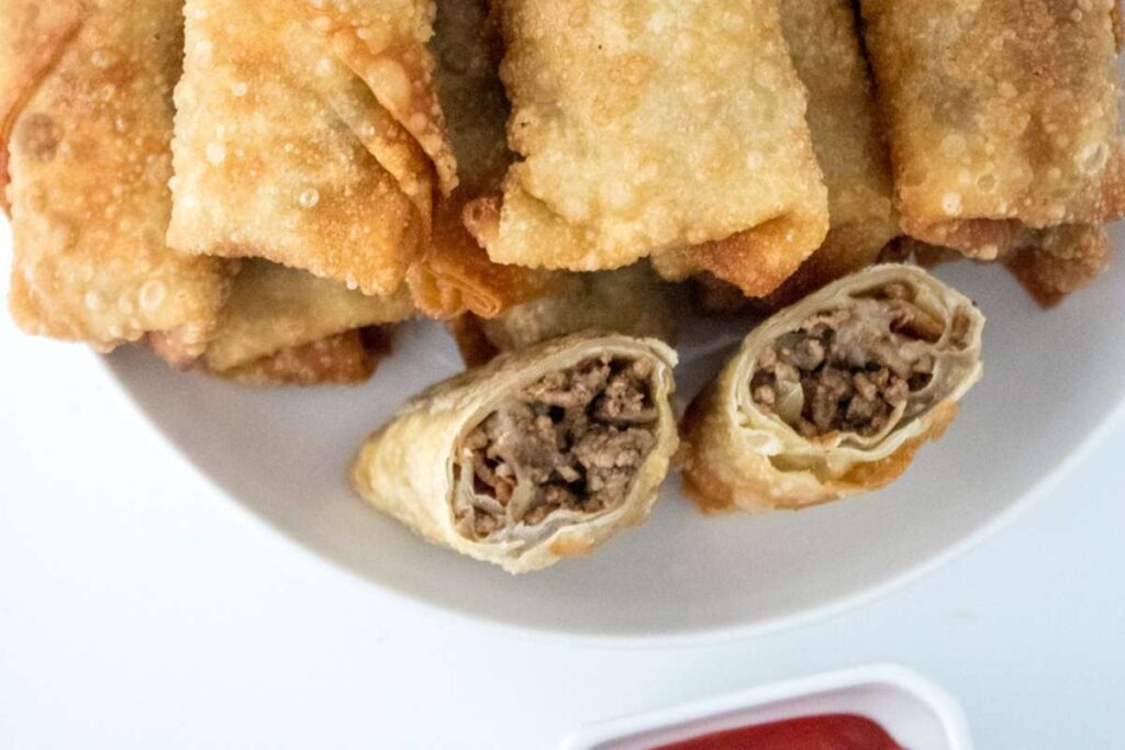 Bacon Cheeseburger Egg Rolls by Two Kids and a Coupon