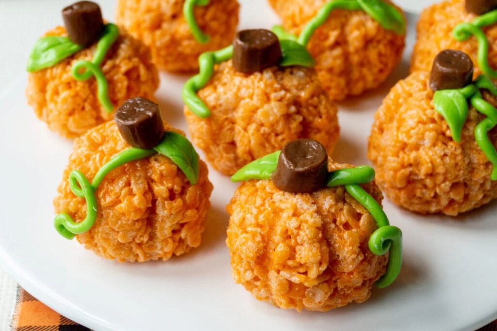 Pumpkin Rice Krispie Treats with Tootsie Roll Stems by Little Black Skillet