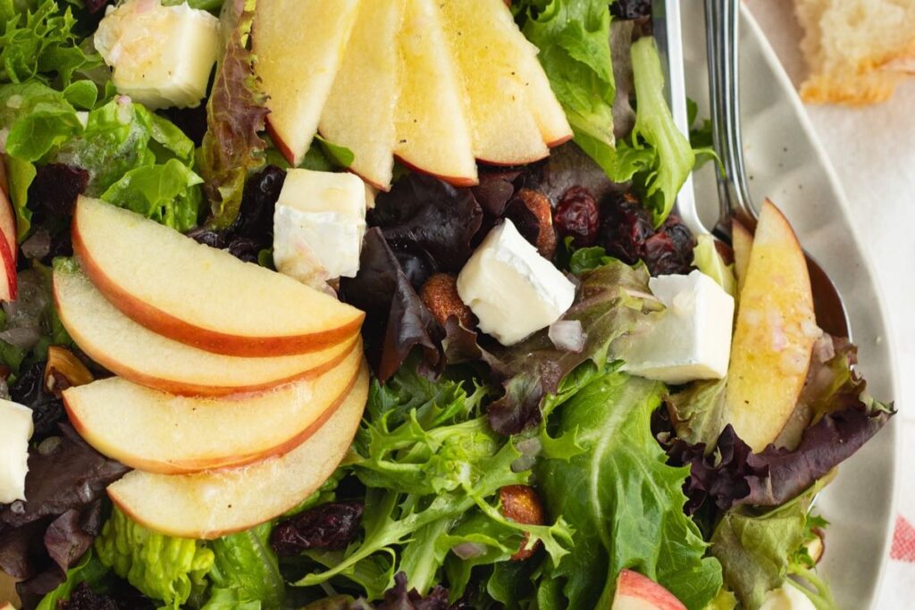 Salad with Brie Apple and Shallot Vinaigrette by sprinkled with balance