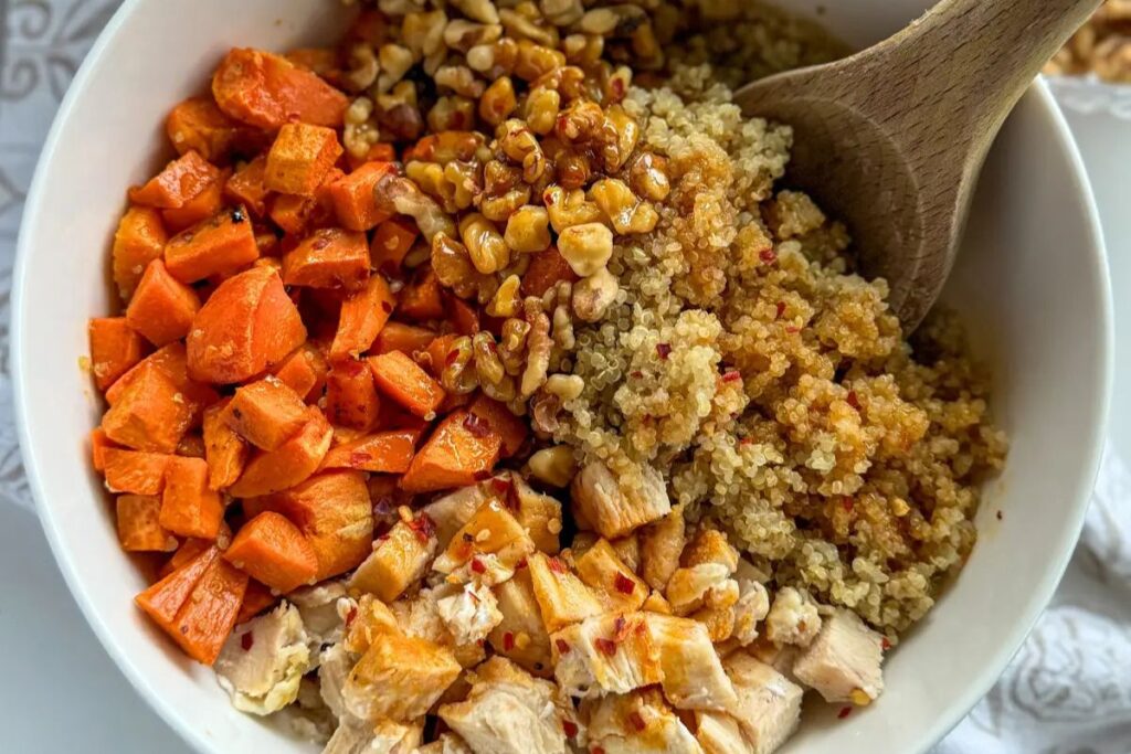 Sweet Potato Quinoa Bowl with Honey Sriracha Sauce by Moderately Messy Rd