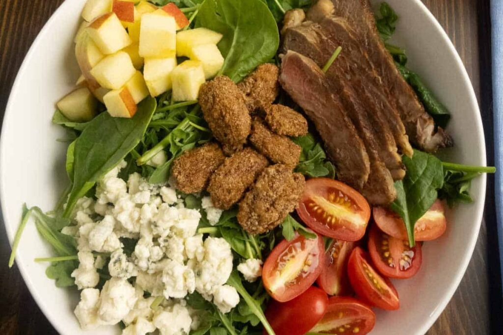Arugula and Spinach Salad with Steak Apples and Blue Cheese by The Bluster and the Burrow